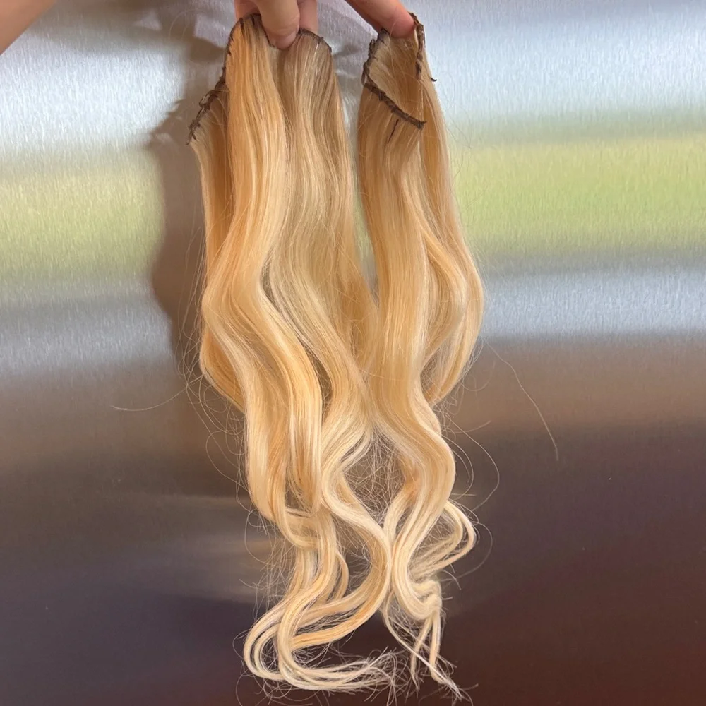 Intertwined Blonde Sew in hair extensions